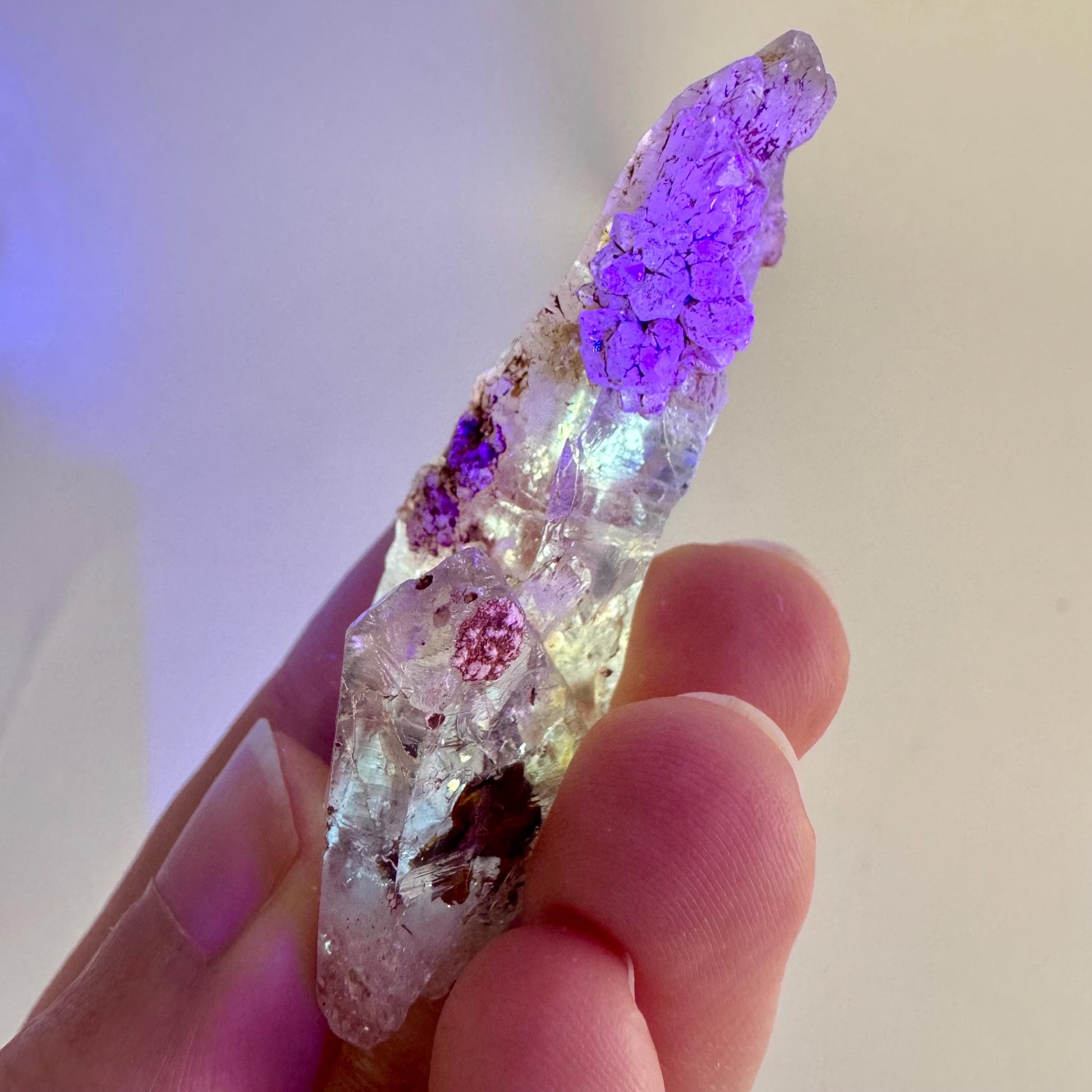 Firefly Petroleum Quartz | UV reactive crystal, fluorescent mineral from Madagascar