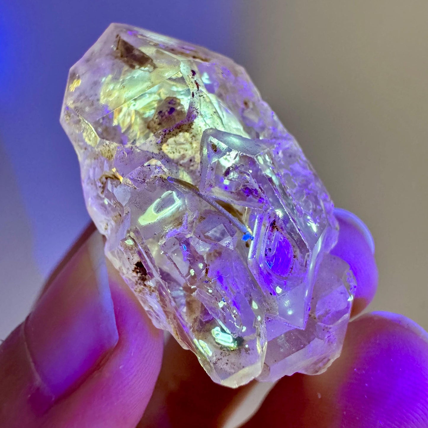 Firefly Petroleum Quartz | UV reactive crystal, fluorescent mineral from Madagascar