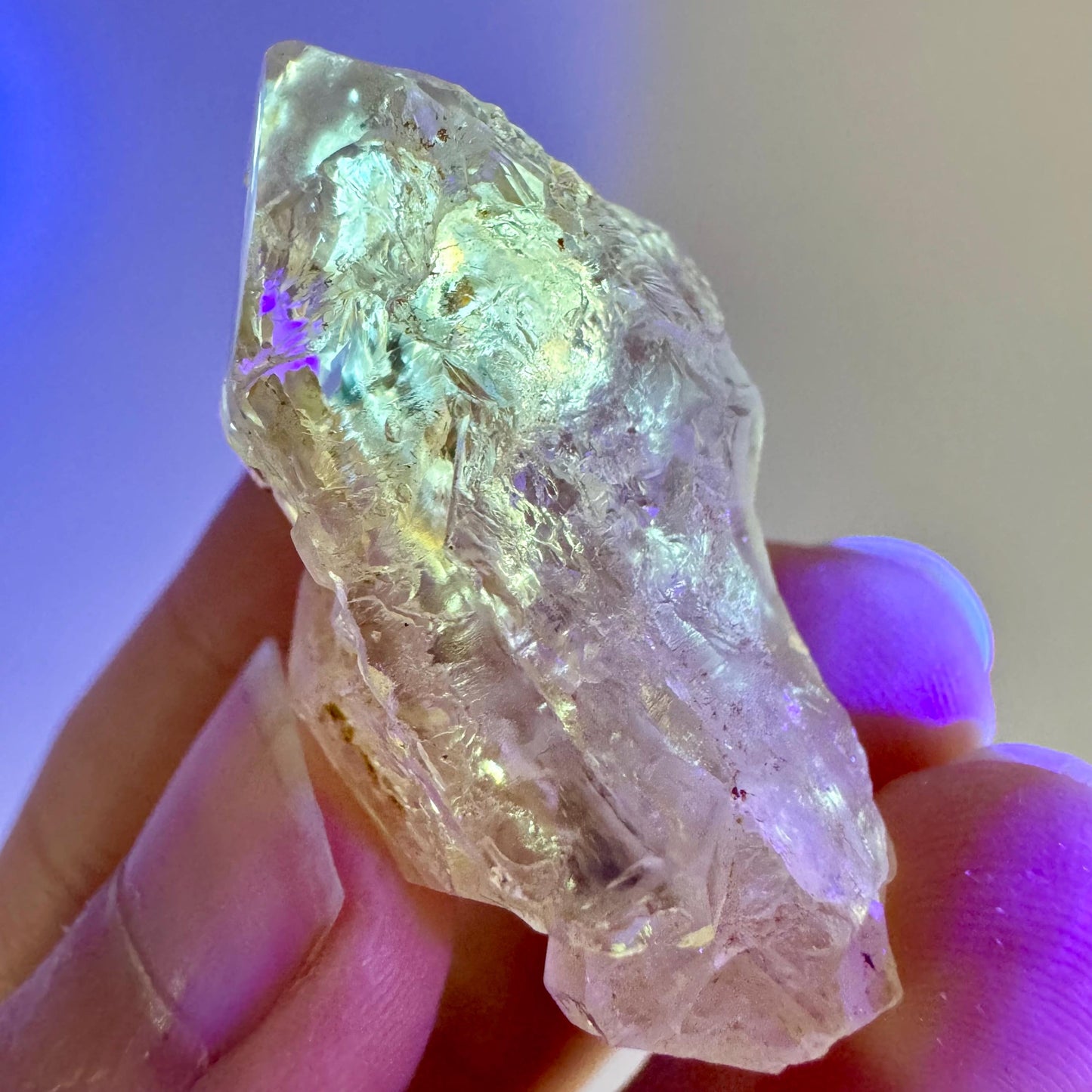 Firefly Petroleum Quartz | UV reactive crystal, fluorescent mineral from Madagascar