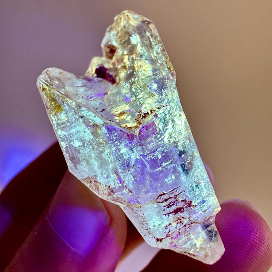 Firefly Petroleum Quartz | UV reactive crystal, fluorescent mineral from Madagascar