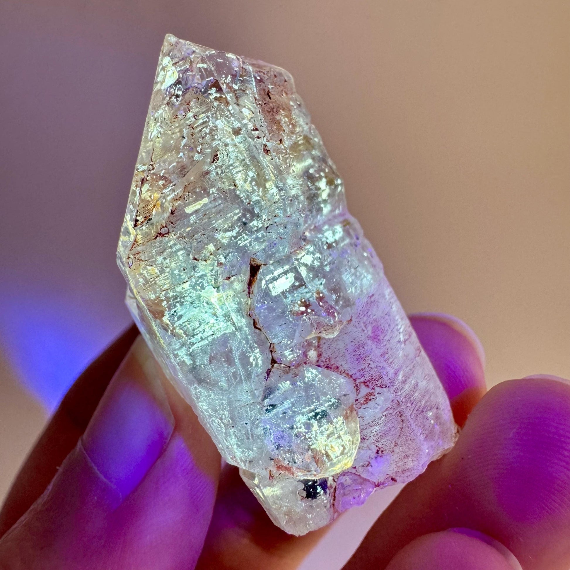 Firefly Petroleum Quartz | UV reactive crystal, fluorescent mineral from Madagascar