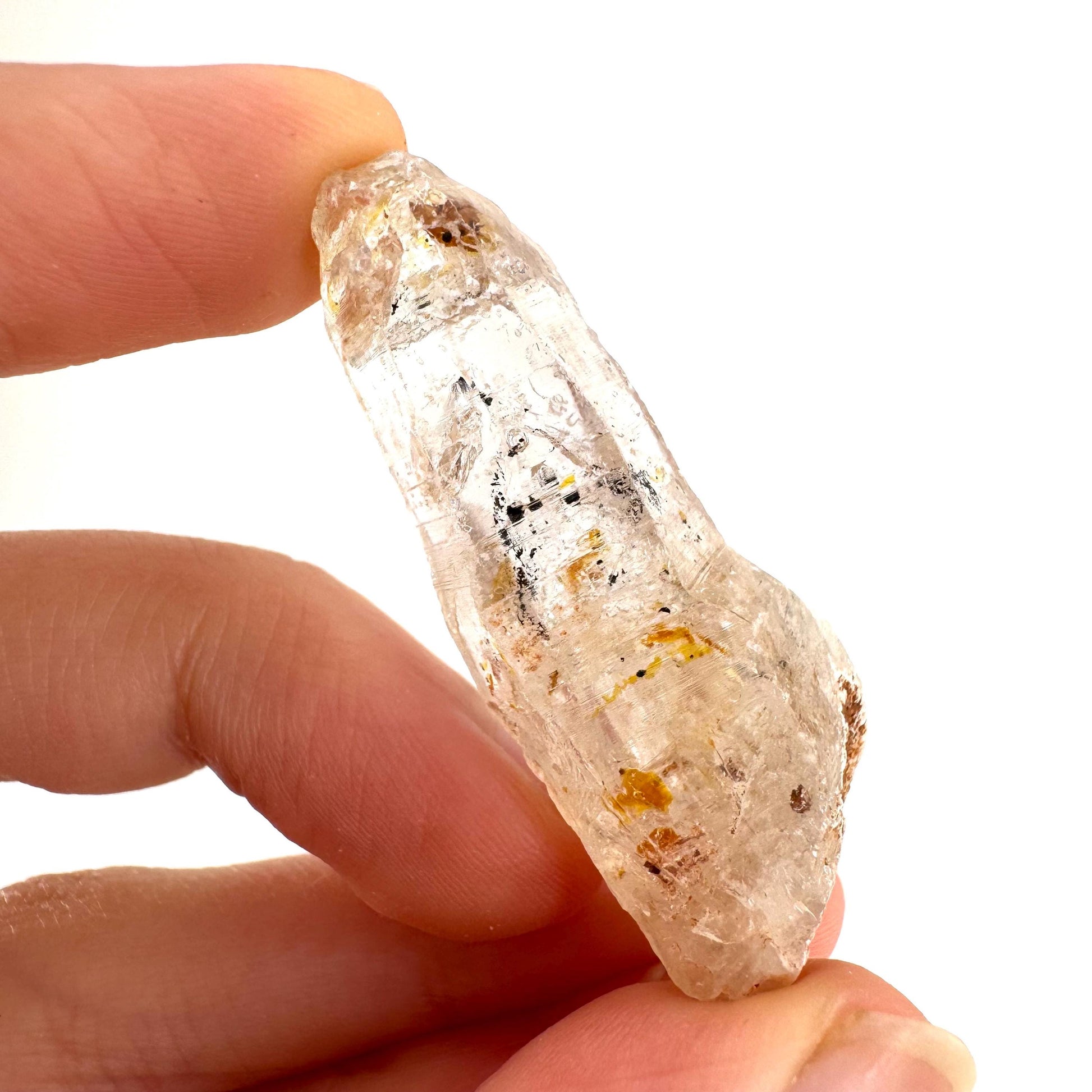Firefly Petroleum Quartz | UV reactive crystal, fluorescent mineral from Madagascar
