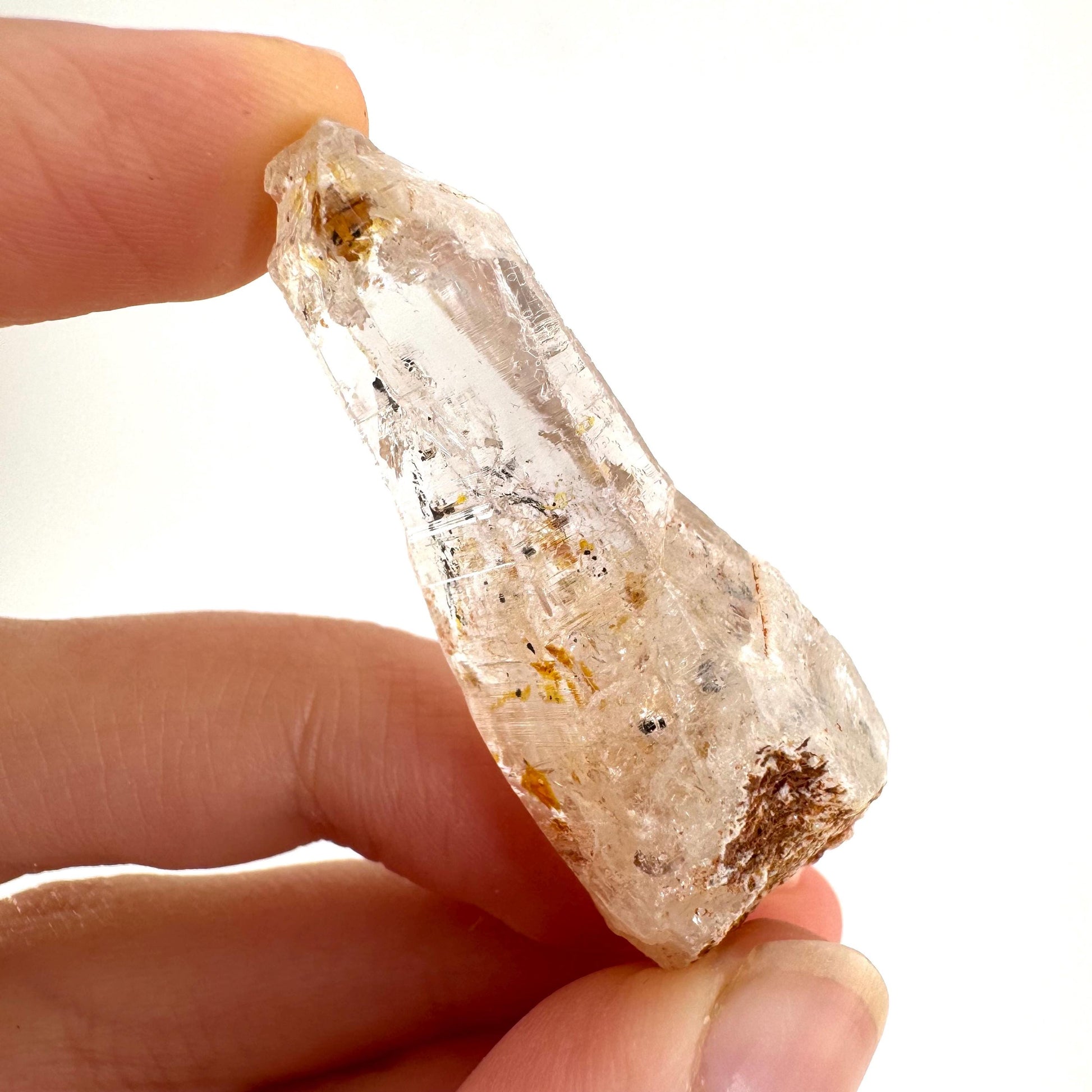 Firefly Petroleum Quartz | UV reactive crystal, fluorescent mineral from Madagascar