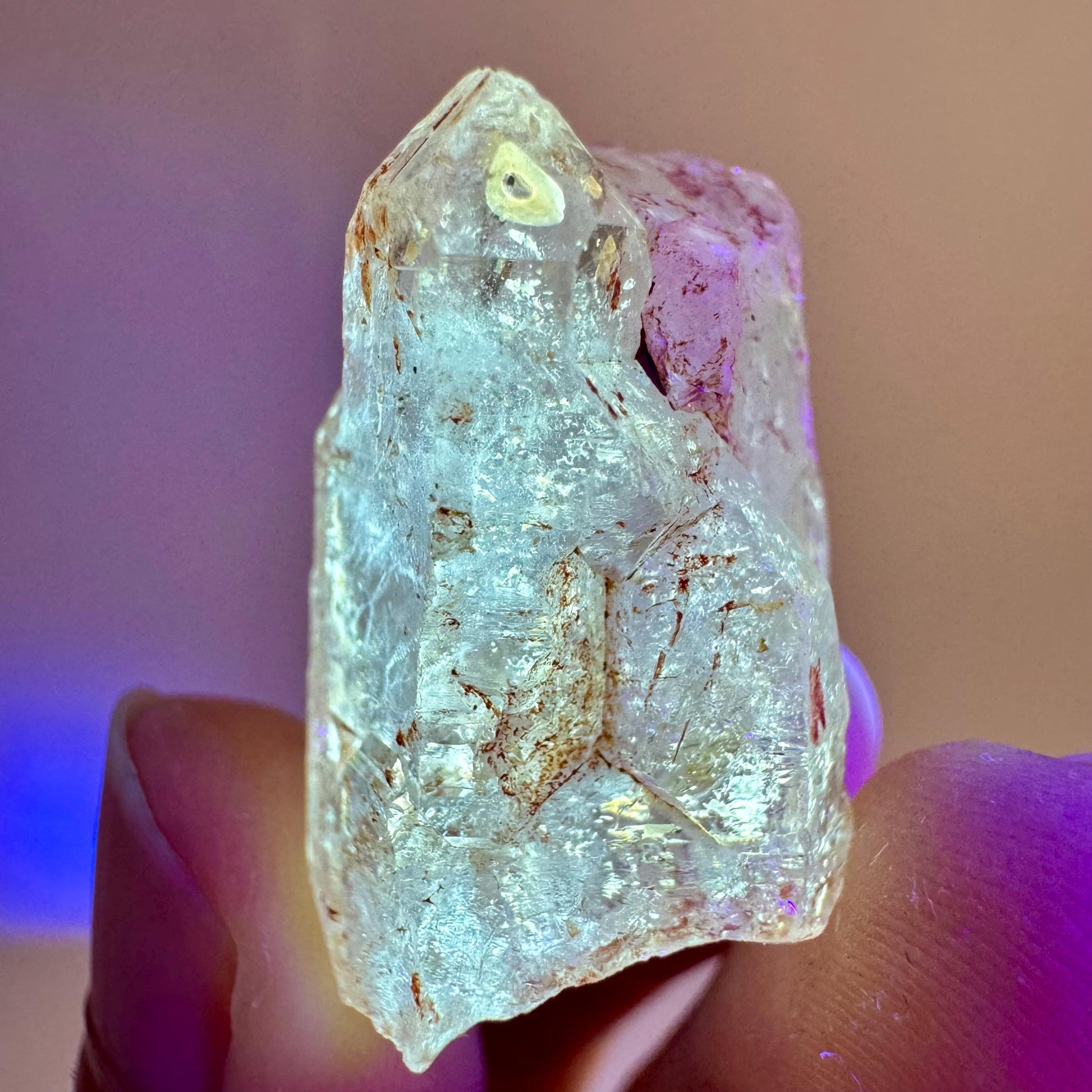 Firefly Petroleum Quartz | UV reactive crystal, fluorescent mineral from Madagascar