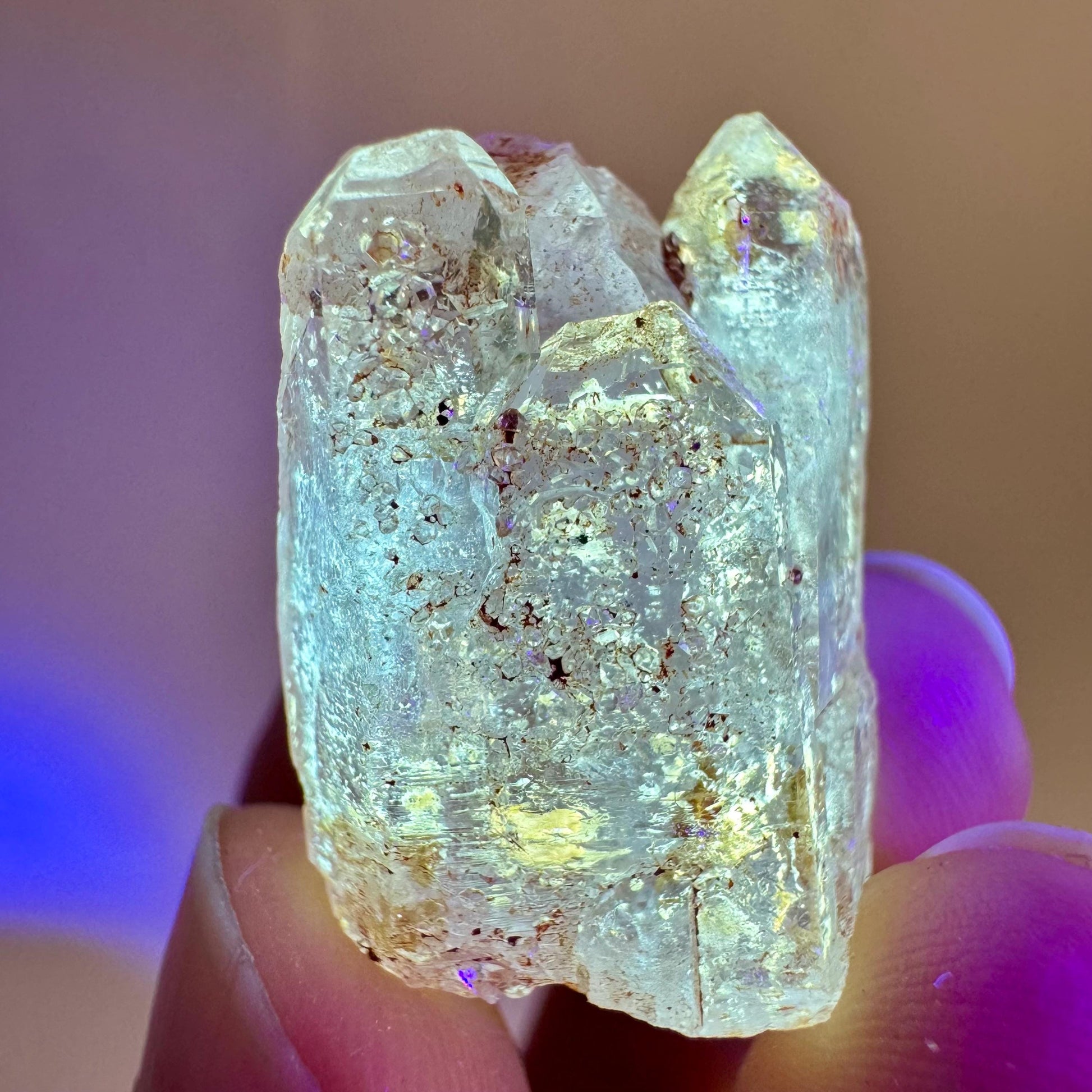 Firefly Petroleum Quartz | UV reactive crystal, fluorescent mineral from Madagascar