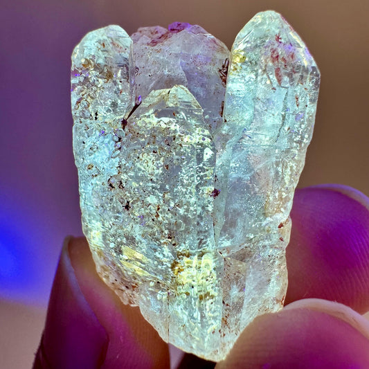 Firefly Petroleum Quartz | UV reactive crystal, fluorescent mineral from Madagascar