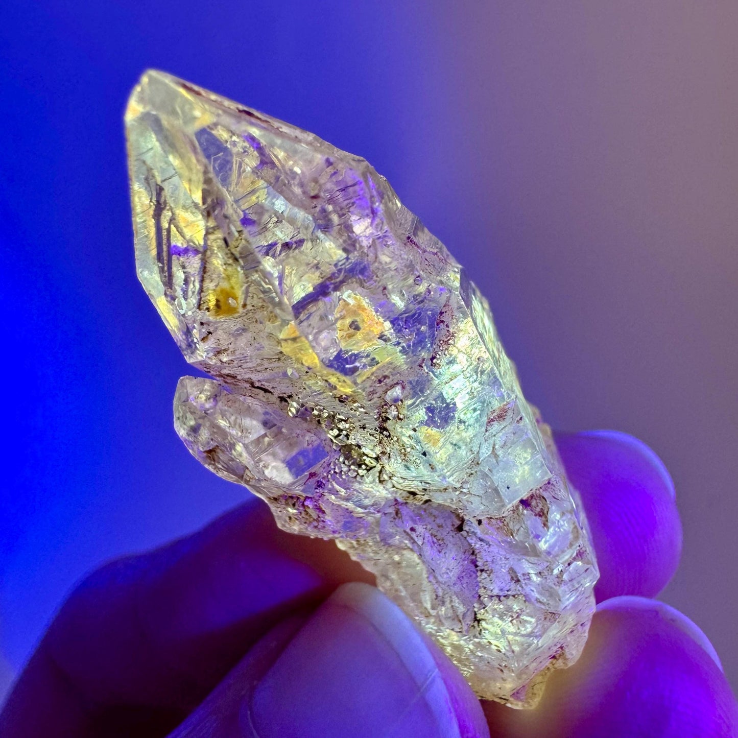Firefly Petroleum Quartz | UV reactive crystal, fluorescent mineral from Madagascar