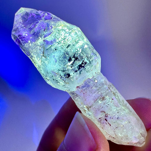 Firefly Petroleum Quartz Sceptre | UV reactive crystal, fluorescent mineral from Madagascar