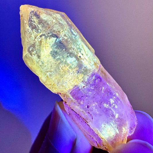 Firefly Petroleum Quartz Sceptre | UV reactive crystal, fluorescent mineral from Madagascar