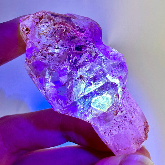 Firefly Petroleum Quartz Sceptre | UV reactive crystal, fluorescent mineral from Madagascar