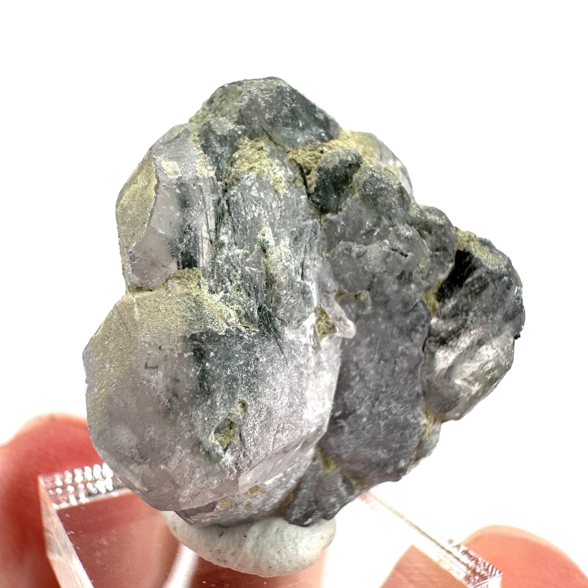 Fluorapatite with Actinolite Inclusions | natural purple crystal, mineral specimen from Pakistan