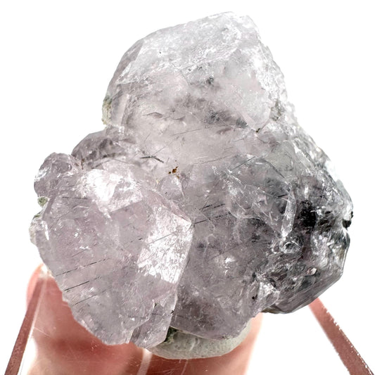 Fluorapatite with Actinolite Inclusions | natural purple crystal, mineral specimen from Pakistan