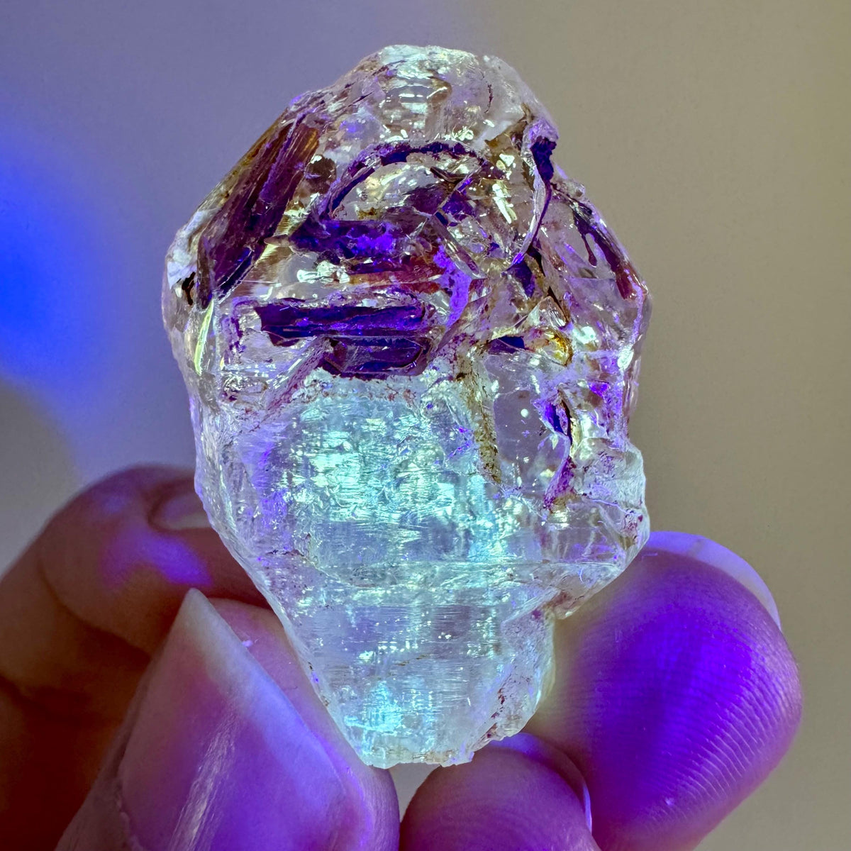 Petroleum Quartz | UV reactive firefly crystal, fluorescent mineral specimen from Madagascar