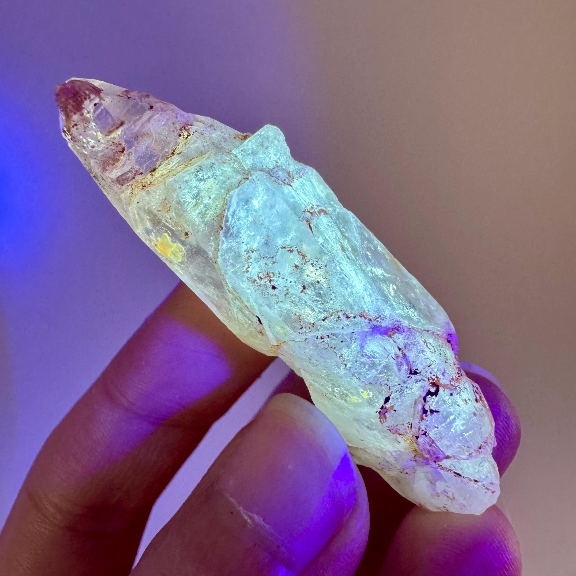 Petroleum Quartz | UV reactive firefly crystal, fluorescent mineral specimen from Madagascar