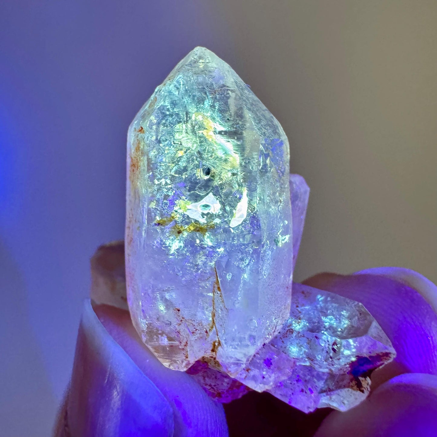 Petroleum Quartz | UV reactive firefly crystal, fluorescent mineral specimen from Madagascar