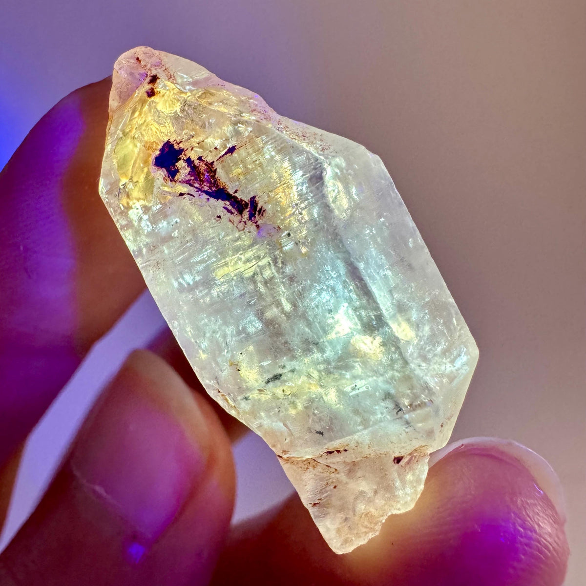 Petroleum Quartz | UV reactive firefly crystal, fluorescent mineral specimen from Madagascar