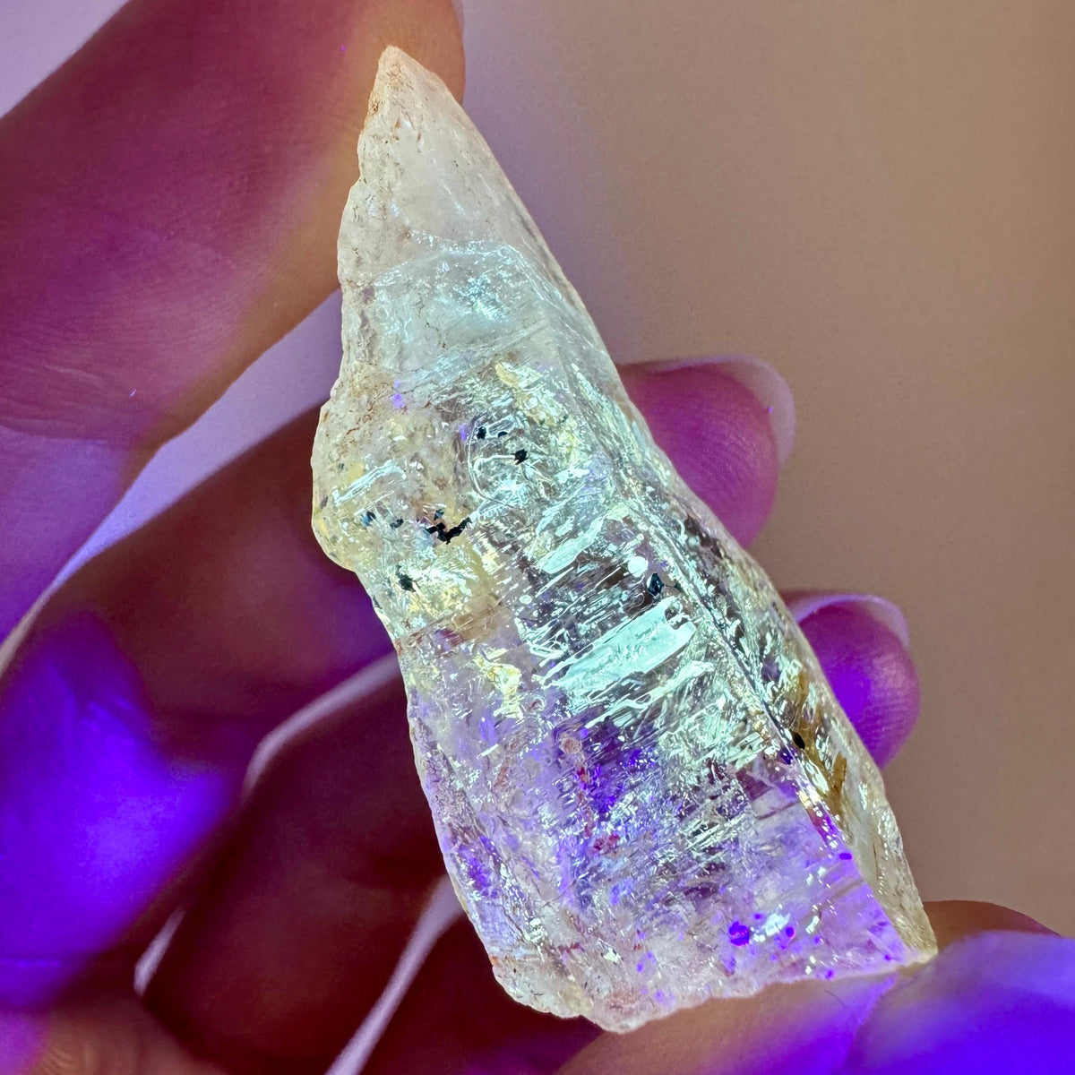 Petroleum Quartz | UV reactive firefly crystal, fluorescent mineral specimen from Madagascar