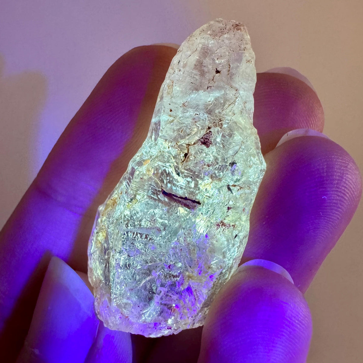 Petroleum Quartz | UV reactive firefly crystal, fluorescent mineral specimen from Madagascar
