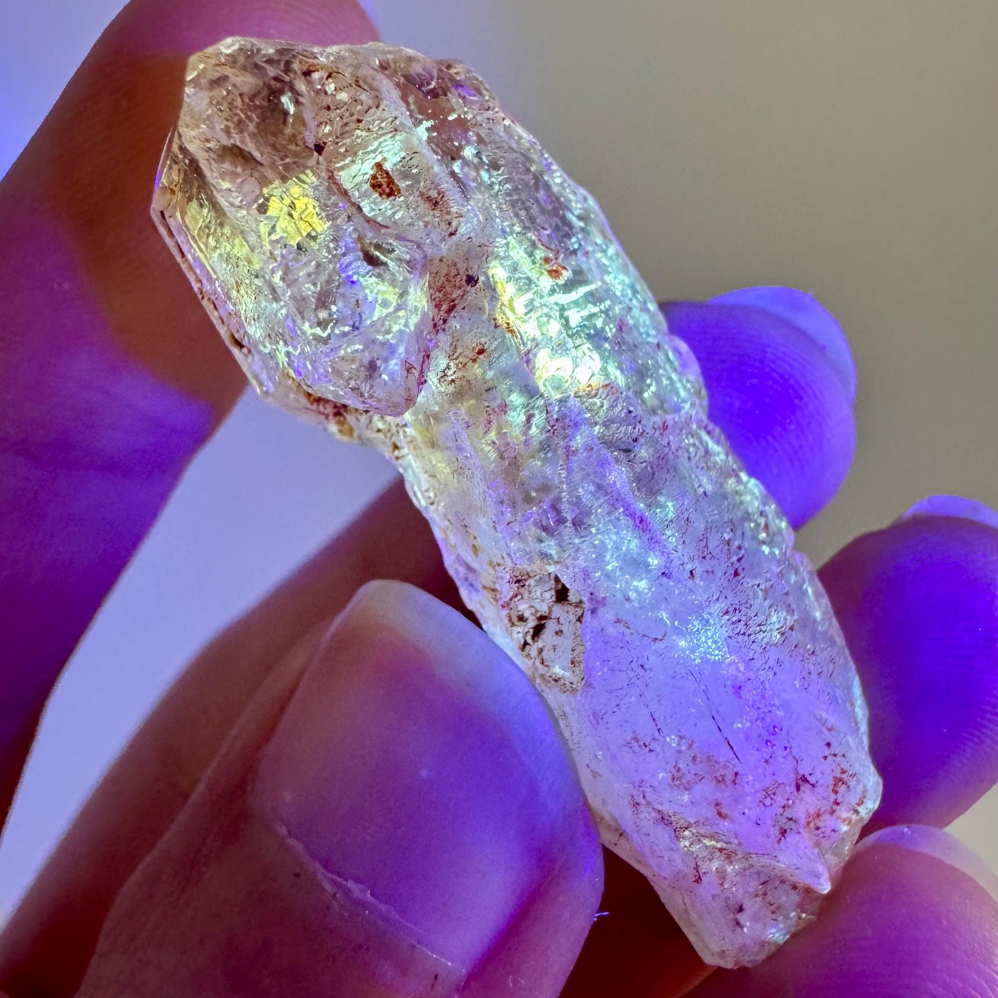 Petroleum Quartz | UV reactive firefly crystal, fluorescent mineral specimen from Madagascar