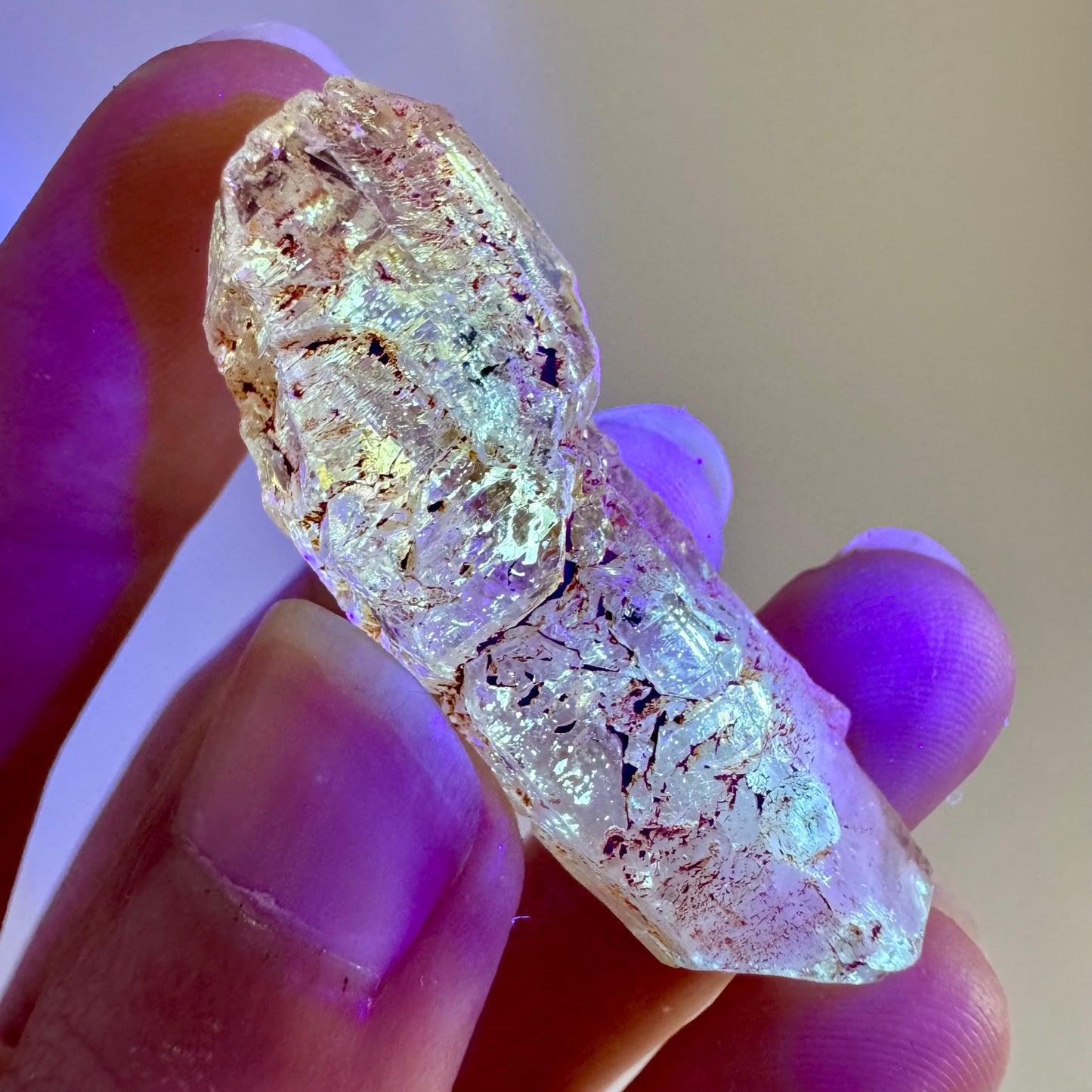 Petroleum Quartz | UV reactive firefly crystal, fluorescent mineral specimen from Madagascar