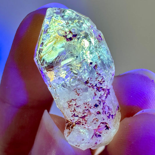 Petroleum Quartz | UV reactive firefly crystal, fluorescent mineral specimen from Madagascar
