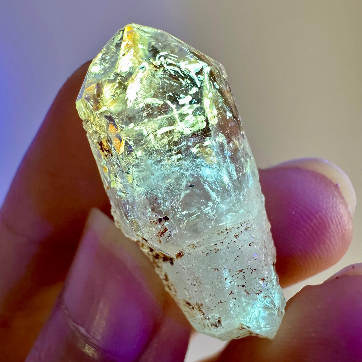 Petroleum Quartz | UV reactive firefly crystal, fluorescent mineral specimen from Madagascar