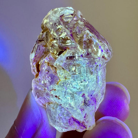 Petroleum Quartz | UV reactive firefly crystal, fluorescent mineral specimen from Madagascar