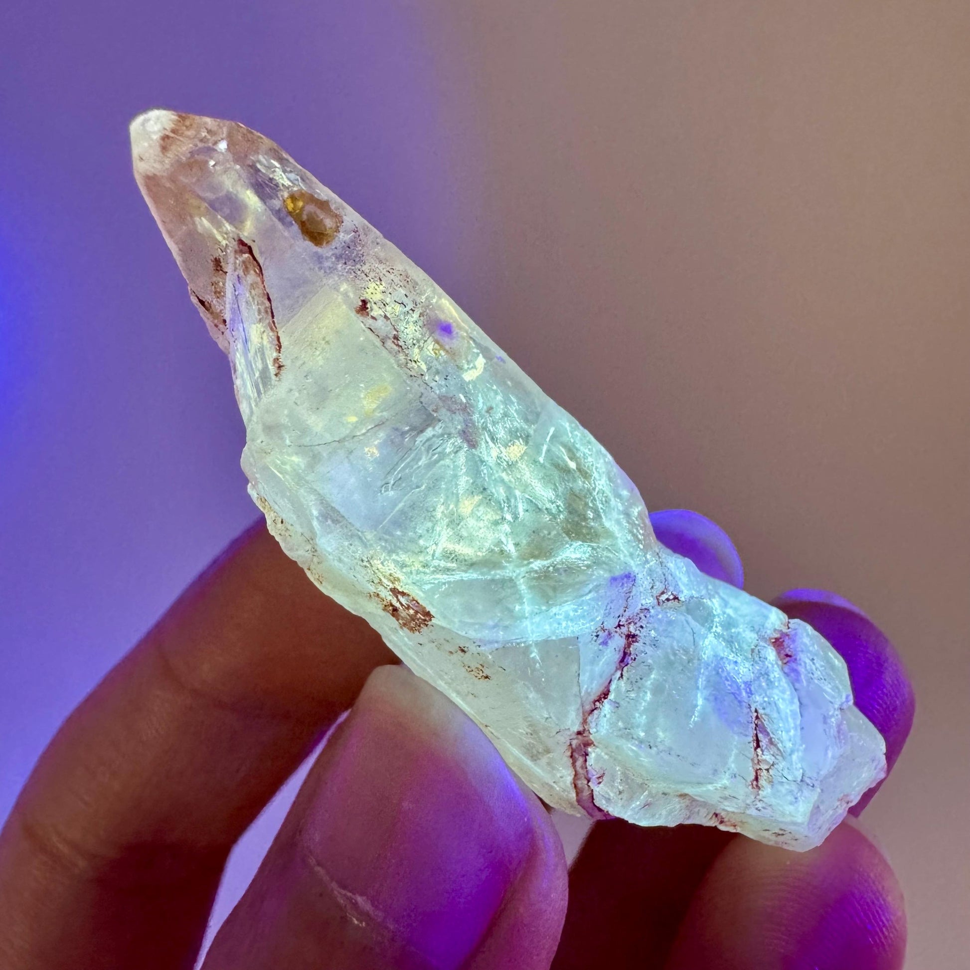 Petroleum Quartz | UV reactive firefly crystal, fluorescent mineral specimen from Madagascar