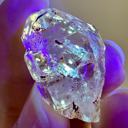 Petroleum Quartz | UV reactive firefly crystal, fluorescent mineral specimen from Madagascar