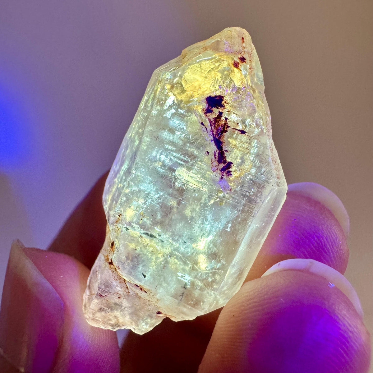 Petroleum Quartz | UV reactive firefly crystal, fluorescent mineral specimen from Madagascar