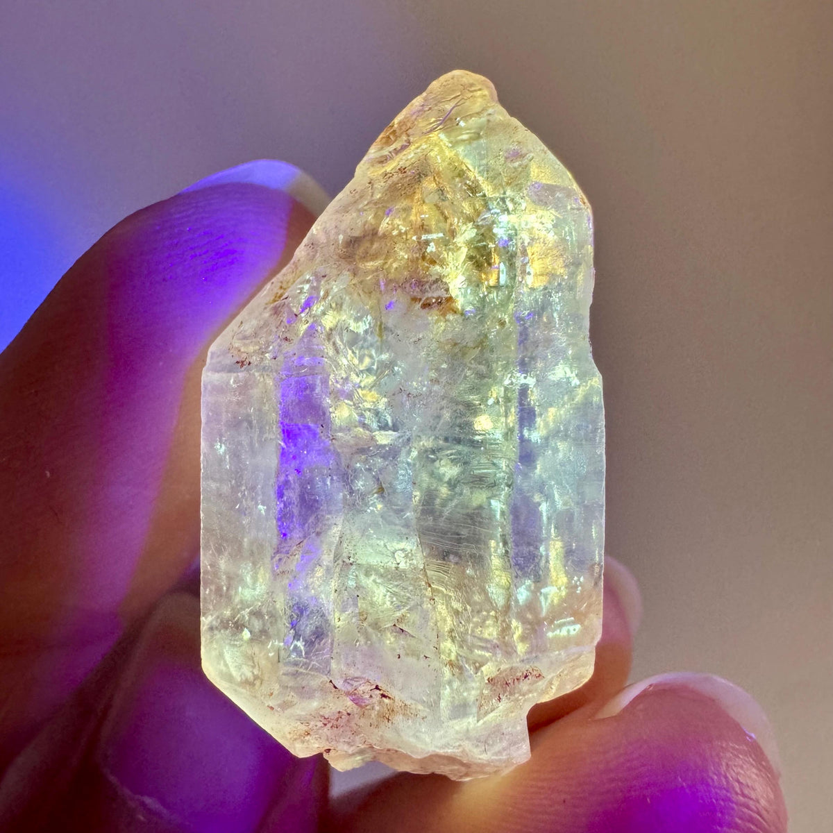 Petroleum Quartz | UV reactive firefly crystal, fluorescent mineral specimen from Madagascar