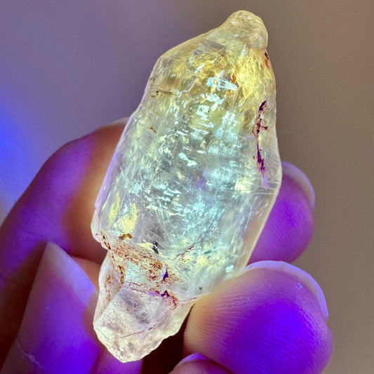 Petroleum Quartz | UV reactive firefly crystal, fluorescent mineral specimen from Madagascar