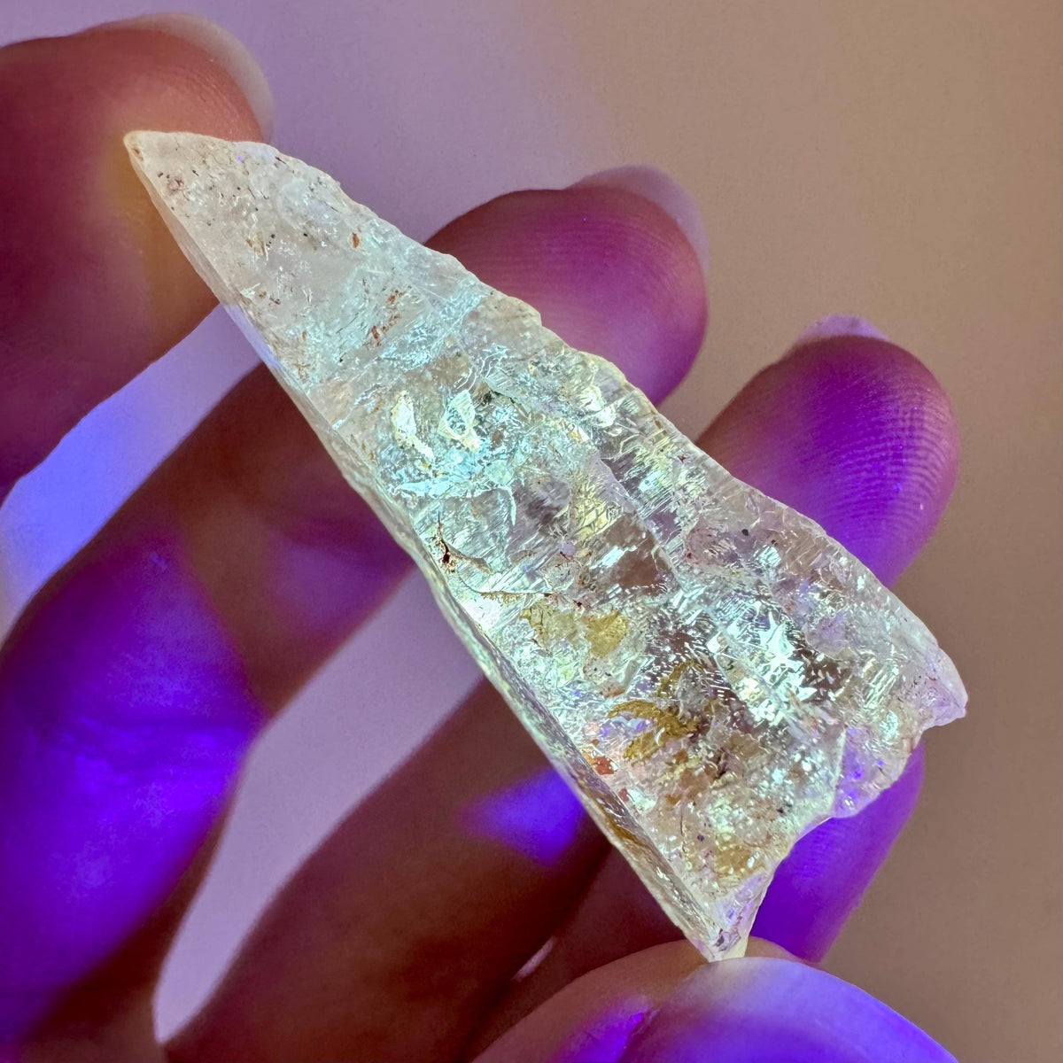 Petroleum Quartz | UV reactive firefly crystal, fluorescent mineral specimen from Madagascar