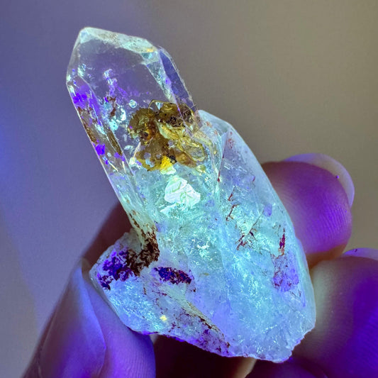 Petroleum Quartz | UV reactive firefly crystal, fluorescent mineral specimen from Madagascar
