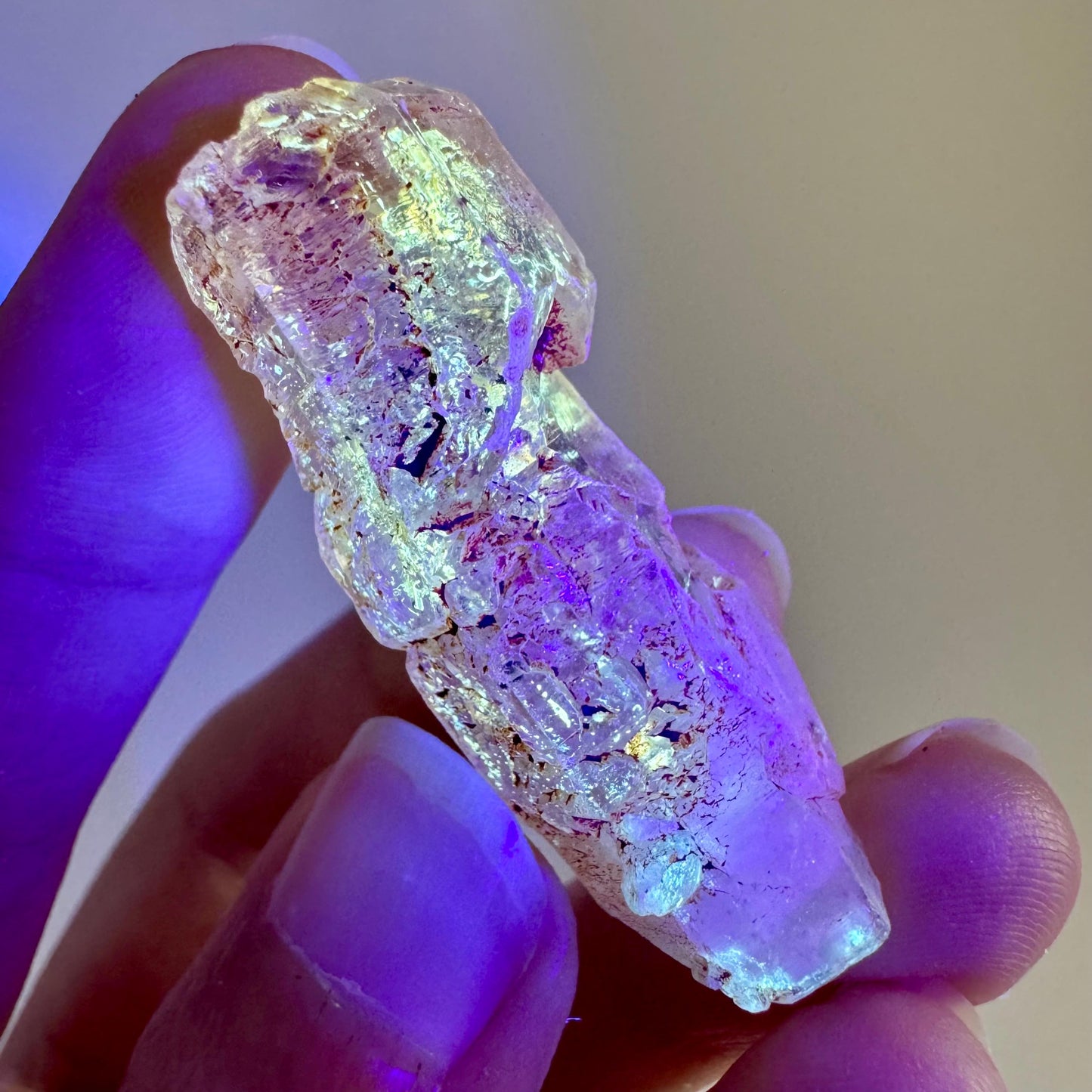 Petroleum Quartz | UV reactive firefly crystal, fluorescent mineral specimen from Madagascar
