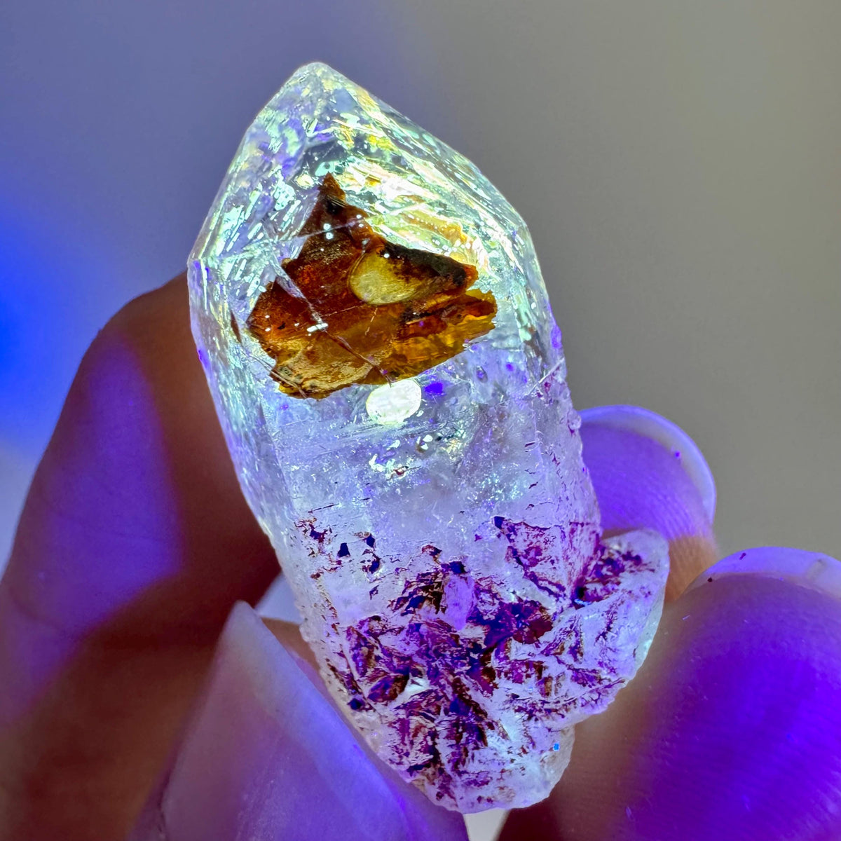 Petroleum Quartz | UV reactive firefly crystal, fluorescent mineral specimen from Madagascar