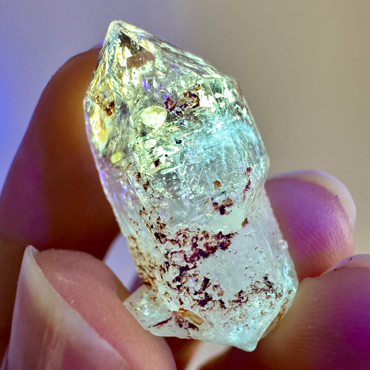 Petroleum Quartz | UV reactive firefly crystal, fluorescent mineral specimen from Madagascar