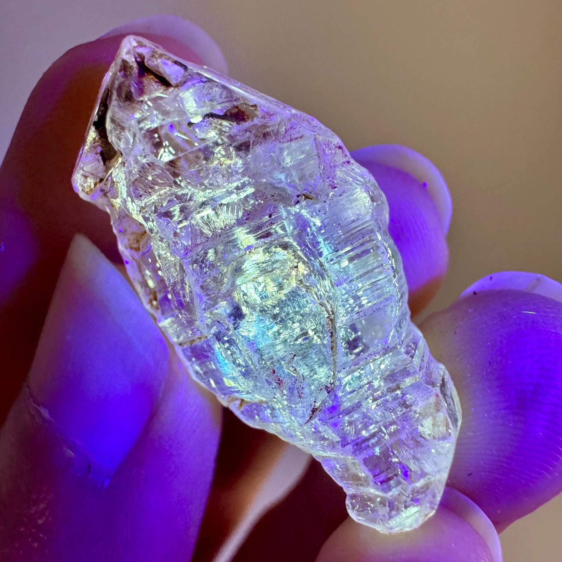 Petroleum Quartz | UV reactive firefly crystal, fluorescent mineral specimen from Madagascar