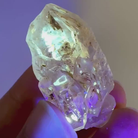 Firefly Petroleum Quartz | UV reactive crystal, fluorescent mineral from Madagascar