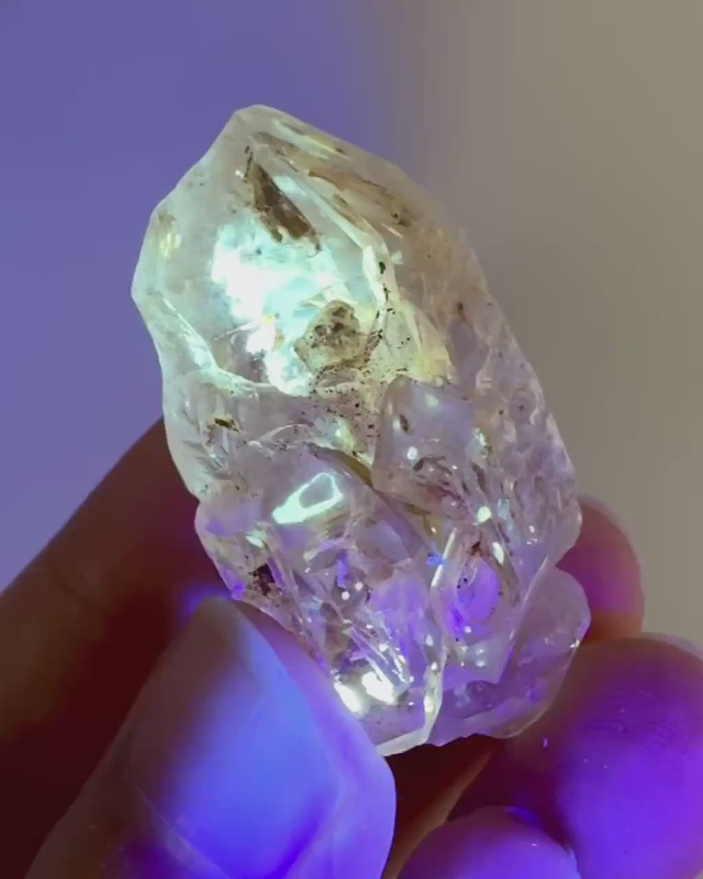 Firefly Petroleum Quartz | UV reactive crystal, fluorescent mineral from Madagascar