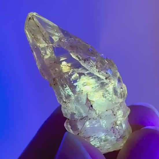 Firefly Petroleum Quartz | UV reactive crystal, fluorescent mineral from Madagascar
