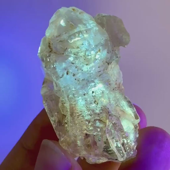 Firefly Petroleum Quartz | UV reactive crystal, fluorescent mineral from Madagascar