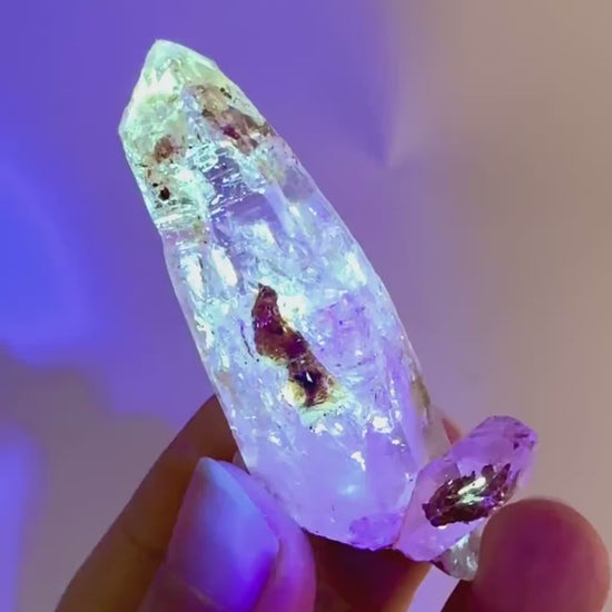 Firefly Petroleum Quartz | UV reactive crystal, fluorescent mineral from Madagascar