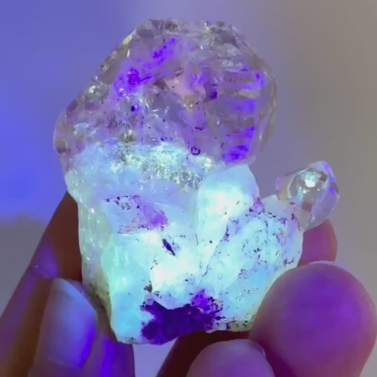 Firefly Petroleum Quartz | UV reactive crystal, fluorescent mineral from Madagascar