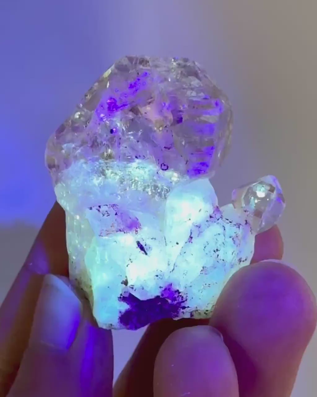 Firefly Petroleum Quartz | UV reactive crystal, fluorescent mineral from Madagascar