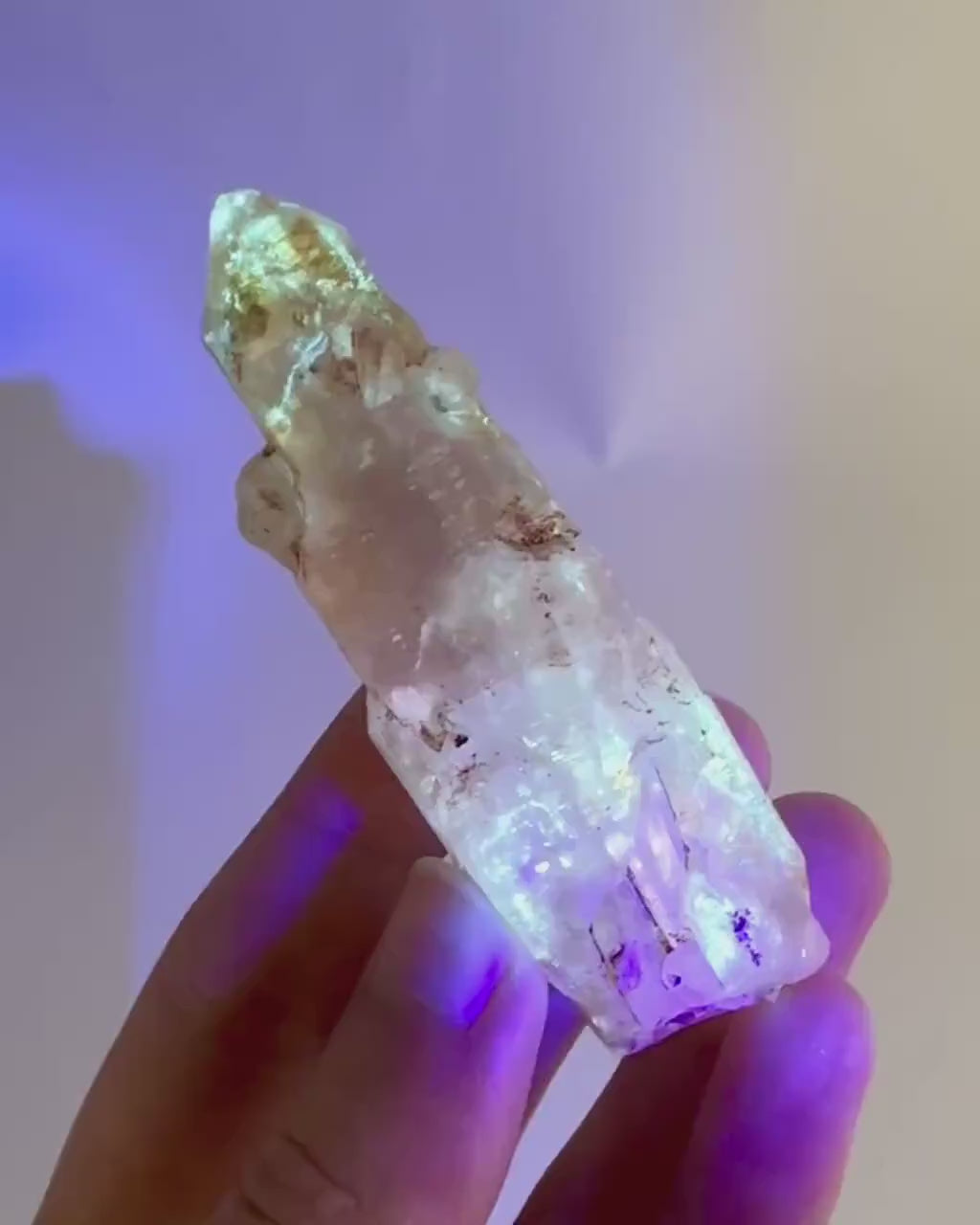 Firefly Petroleum Quartz | UV reactive crystal, fluorescent mineral from Madagascar