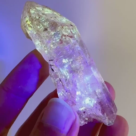 Firefly Petroleum Quartz | UV reactive crystal, fluorescent mineral from Madagascar
