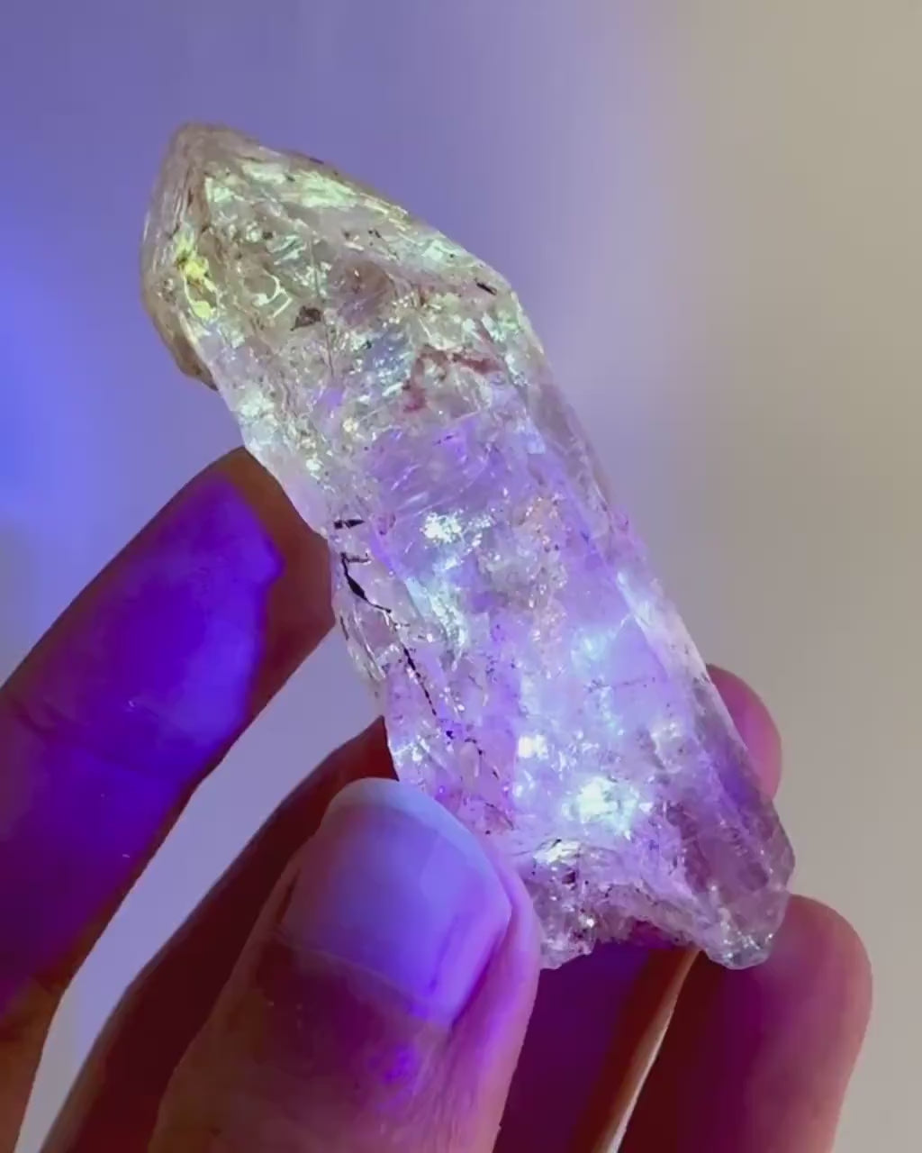 Firefly Petroleum Quartz | UV reactive crystal, fluorescent mineral from Madagascar