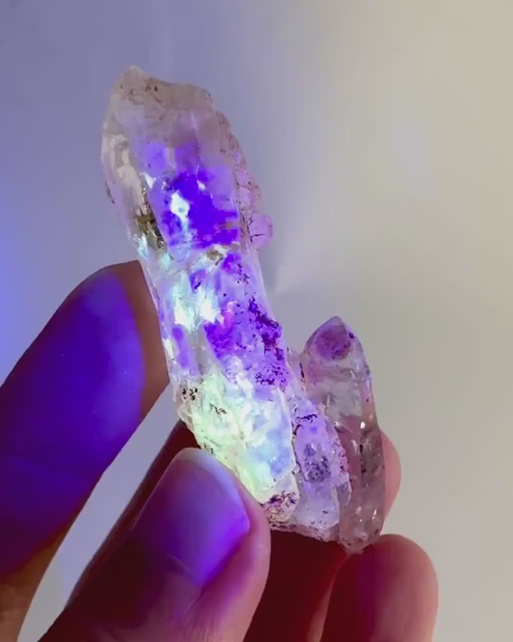 Firefly Petroleum Quartz | UV reactive crystal, fluorescent mineral from Madagascar