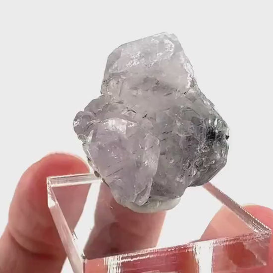 Fluorapatite with Actinolite Inclusions | natural purple crystal, mineral specimen from Pakistan